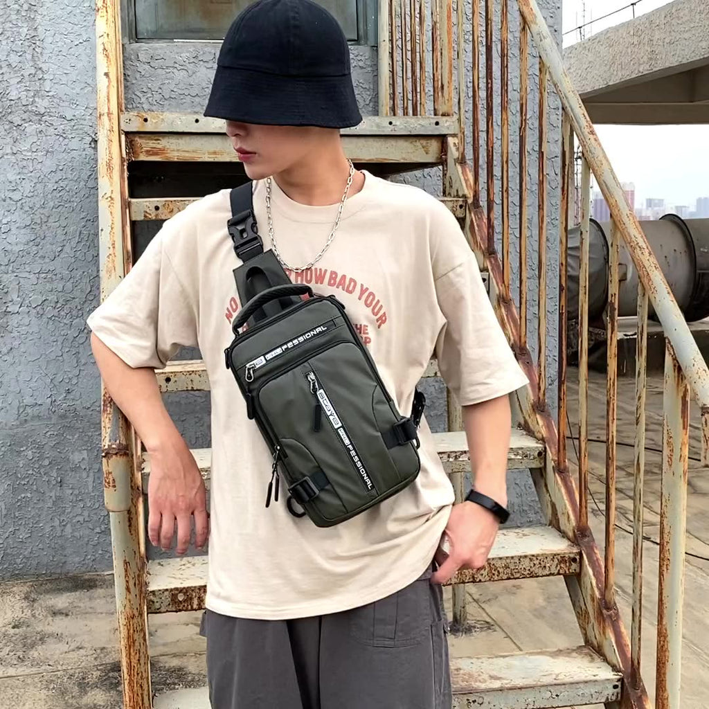 A man wears an olive green, multi-zippered nylon crossbody chest bag with "PROFESSIONAL" branding on metal stairs.