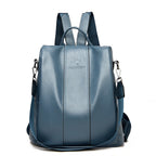 Blue soft leather convertible women’s backpack with a kangaroo logo and adjustable shoulder straps.
