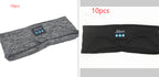 Two Bluetooth music headbands in grey heather and black fabric, featuring built-in control panels for sleeping.