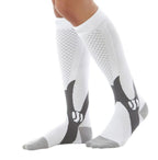 White compression socks with grey checkered patterns and solid grey toes and heels worn on lower legs.
