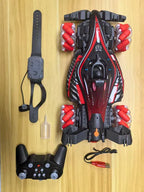 Black and red F1 RC car with spray feature, gesture-control wristband, joystick remote, water dropper, and USB cable.