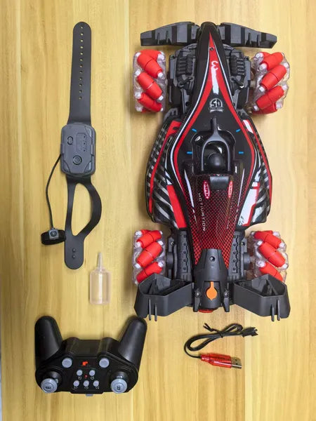 Black and red F1 RC car with spray feature, gesture-control wristband, joystick remote, water dropper, and USB cable.