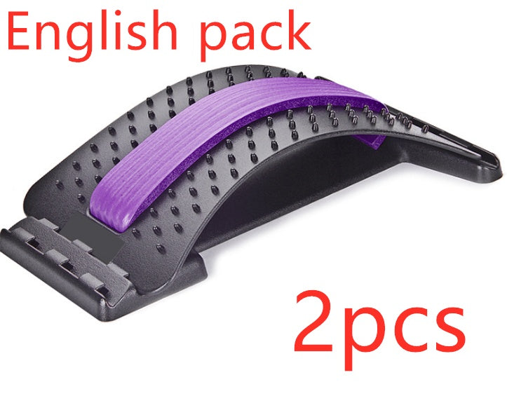 Curved black plastic lumbar support device with a purple foam center strip, acupuncture-style nubs, and adjustable base.