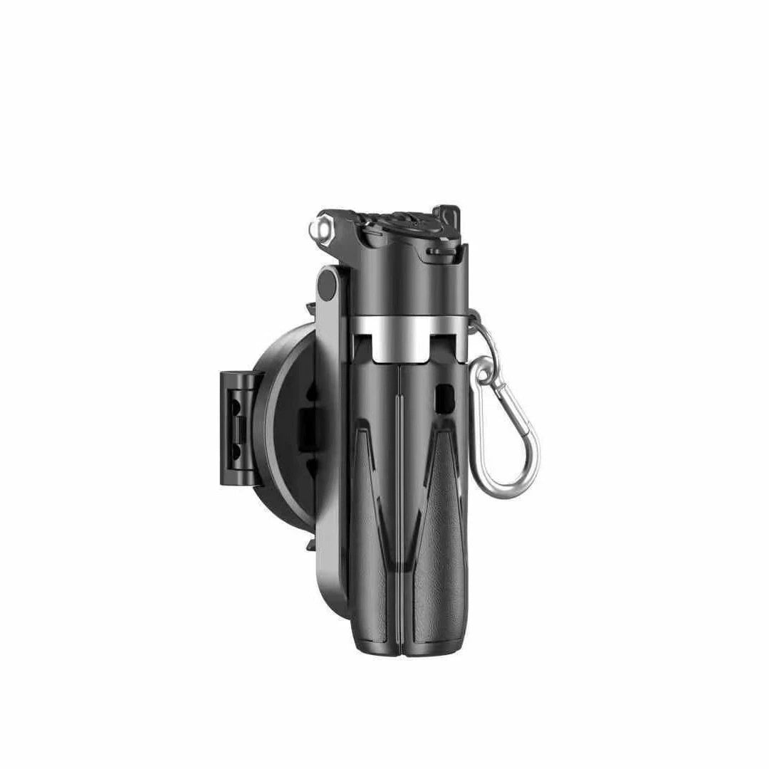 Black, compact 4-in-1 magnetic selfie camera handle with silver accents and a carabiner, shown on a white background.