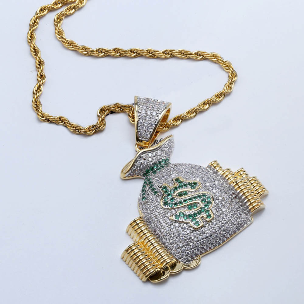 Gold rope chain with a rhinestone-encrusted money bag pendant featuring a green stone dollar sign and gold accents.