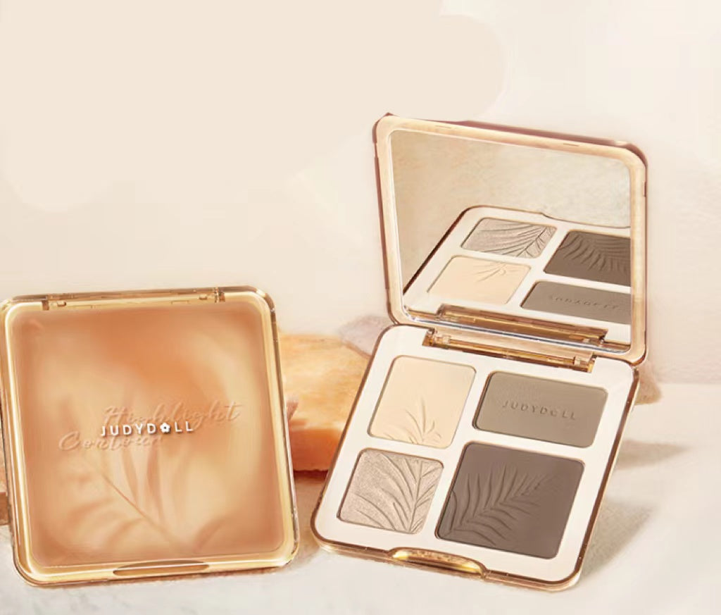 Judydoll 4-color contour palette in a gold case with mirror, featuring matte and shimmer powders with leaf embossing.