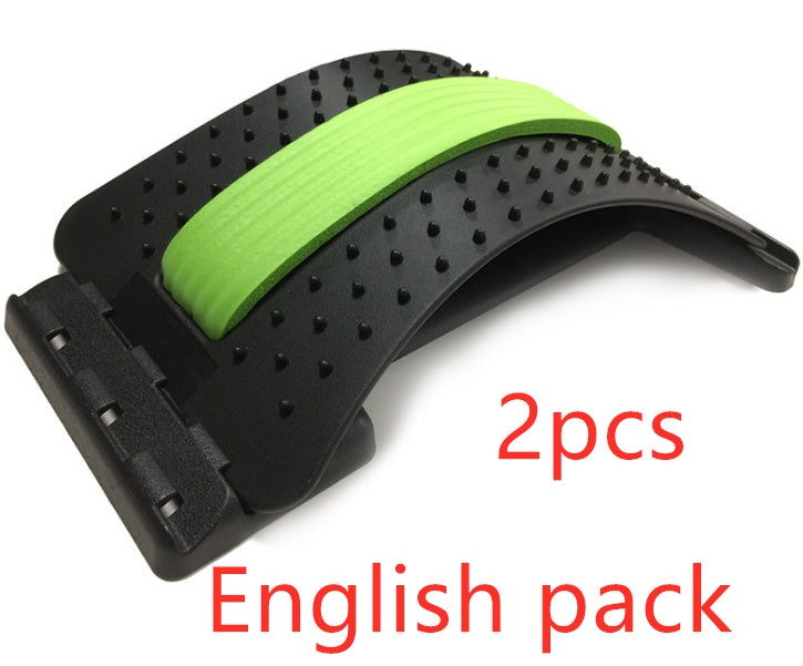 Black and green arched plastic lumbar back stretcher with acupressure nubs and central foam padding. Text: "2pcs".