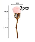 A 3-piece rose-shaped makeup brush with soft pink bristles and a metallic gold stem handle, showing size dimensions.