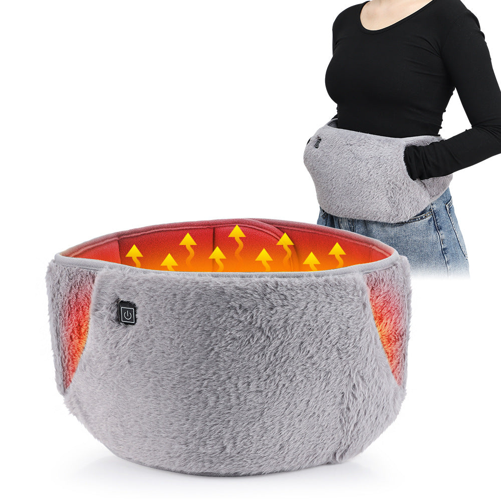 Grey plush electric heating belt with a power button, displaying heat levels and glowing red warmth icons.