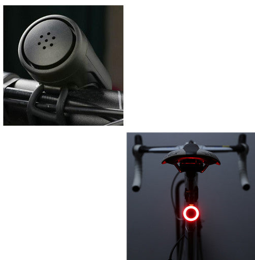 Matte black, circular USB bicycle taillight with a rubber mount, showing a bright red LED ring glowing on a bike post.