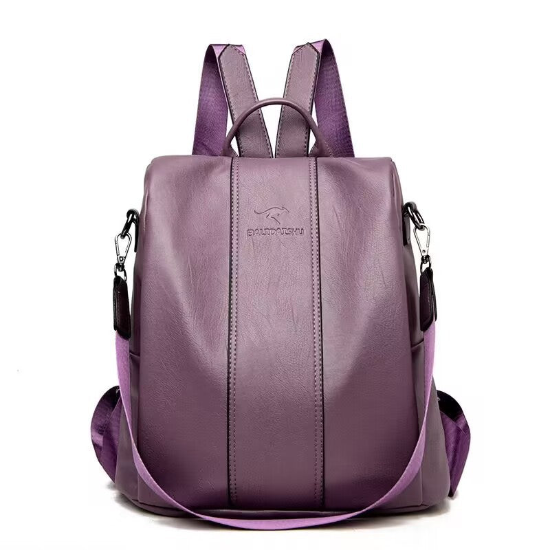 Purple soft leather women's backpack by Digitaldistribution375 featuring a central kangaroo logo and adjustable straps.