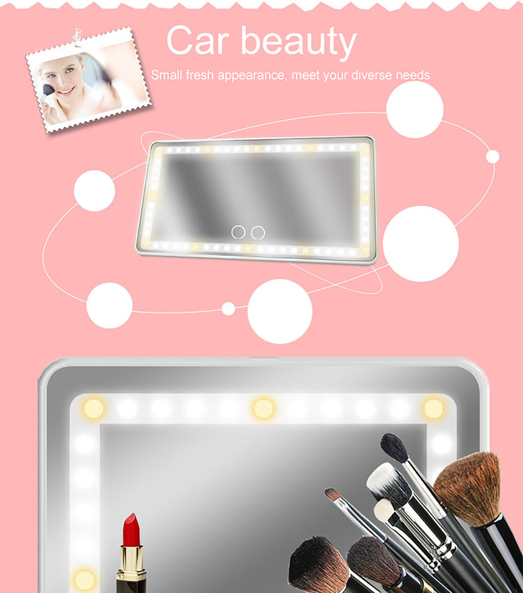 Rectangular car sun visor mirror with LED touch lights on a pink background, featuring makeup brushes and lipstick.