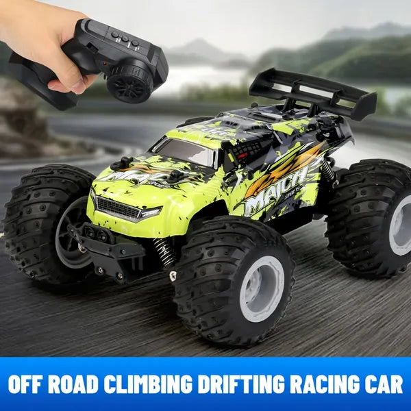A lime green and black remote-controlled monster truck with large off-road tires, held by a black controller.