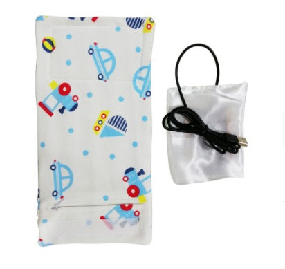 Portable white fabric baby bottle warmer with blue car and toy print, featuring a USB power cable.