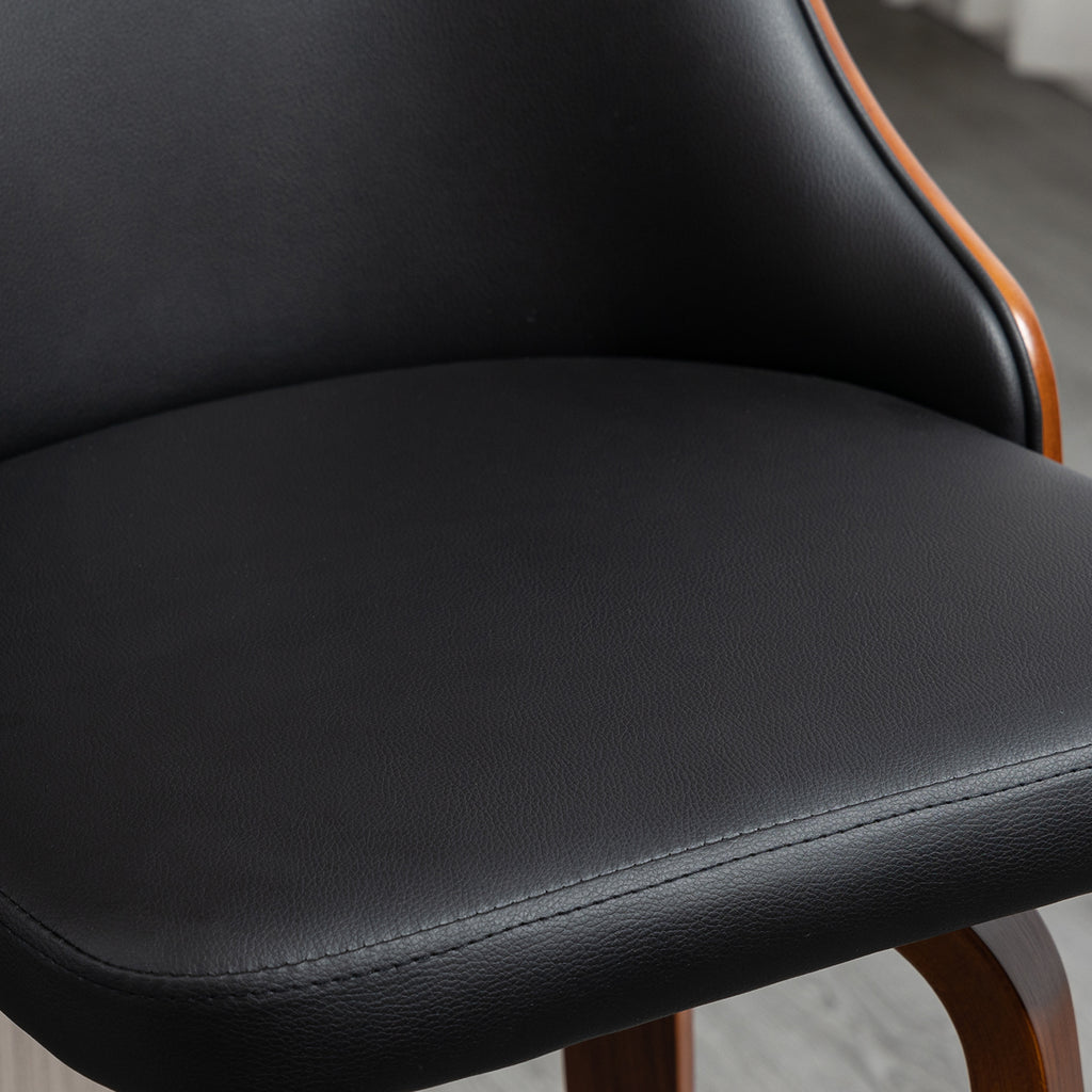 Black faux leather bar stool with a curved, walnut-finished wood frame and backrest. Close-up shot.