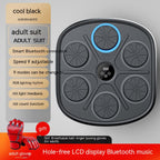 Black, wall-mounted music boxing target with six circular pads, LCD screen, RGB lighting, and included red boxing gloves.