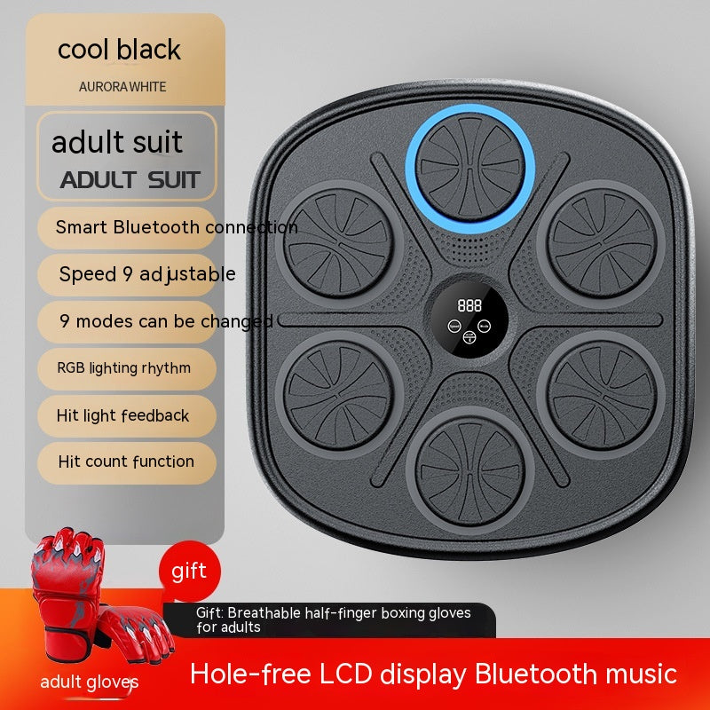 Black, wall-mounted music boxing target with six circular pads, LCD screen, RGB lighting, and included red boxing gloves.