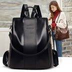 Large black soft leather convertible backpack for women with kangaroo logo, dual straps, and spacious design.