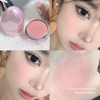 Pink, egg-shaped powder blush compact with a cute face print. Shows smooth, soft-focus matte application on skin.
