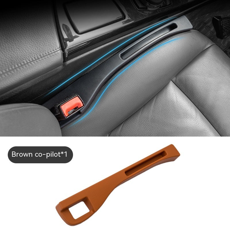 Brown, smooth plastic car seat gap storage organizer designed to fit between the seat and center console.