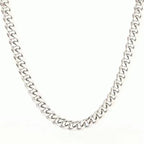 Silver-tone Cuban link chain necklace with polished, interlocking metal links in a classic hip-hop style.