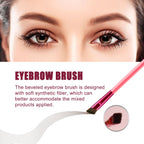 Close-up of a pink-handled, beveled synthetic fiber eyebrow brush against a model's face, demonstrating application.