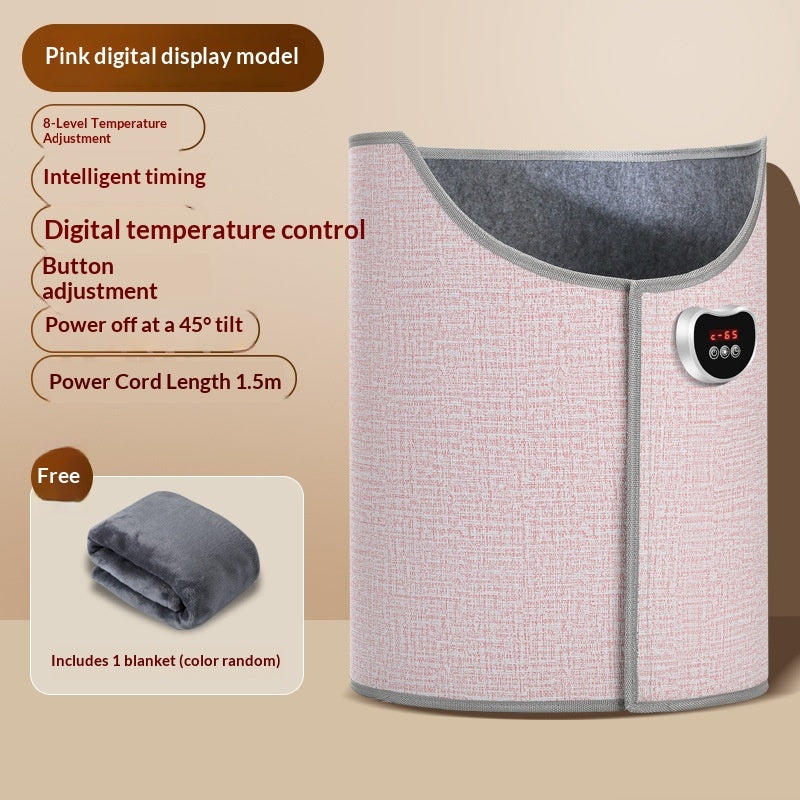 Pink textured under-desk foot warmer with digital temperature control, safety tilt-off, and a free grey blanket.