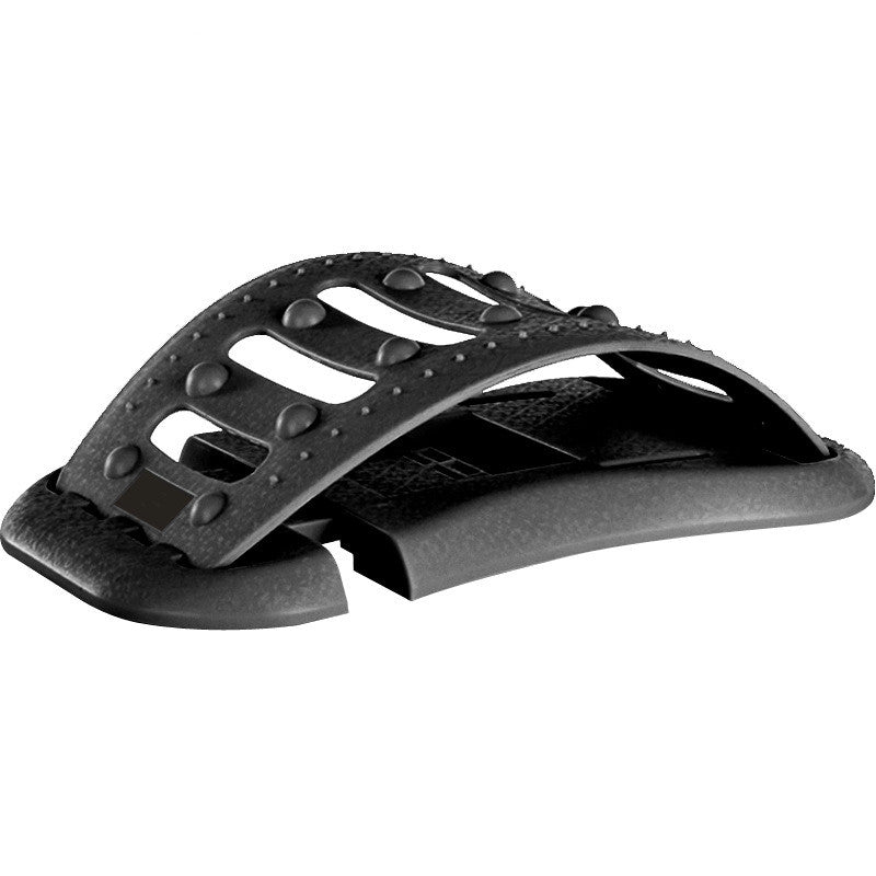 Black plastic lumbar back stretcher device with an arched, textured design and massage nodes for spinal pain relief.