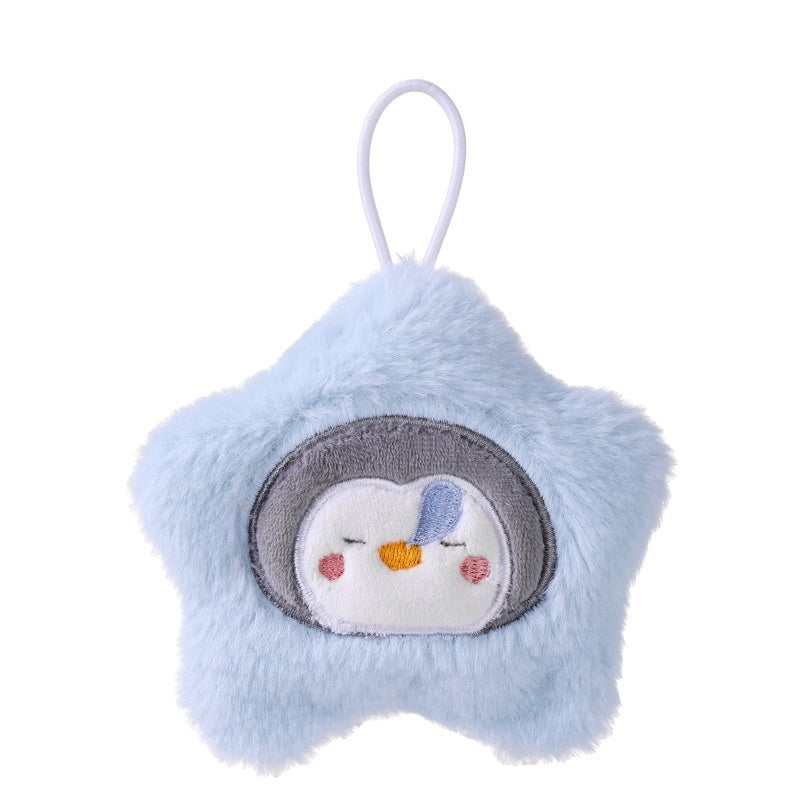 Soft, blue, star-shaped plush hand warmer with an embroidered penguin face and a small hanging loop.