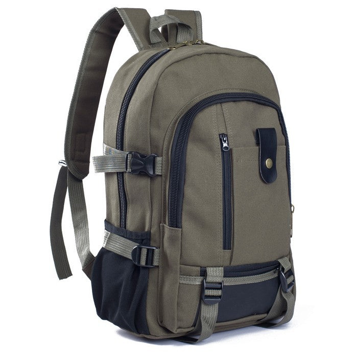 Olive green canvas backpack with black accents, multiple zippered pockets, adjustable buckle straps, and padded straps.