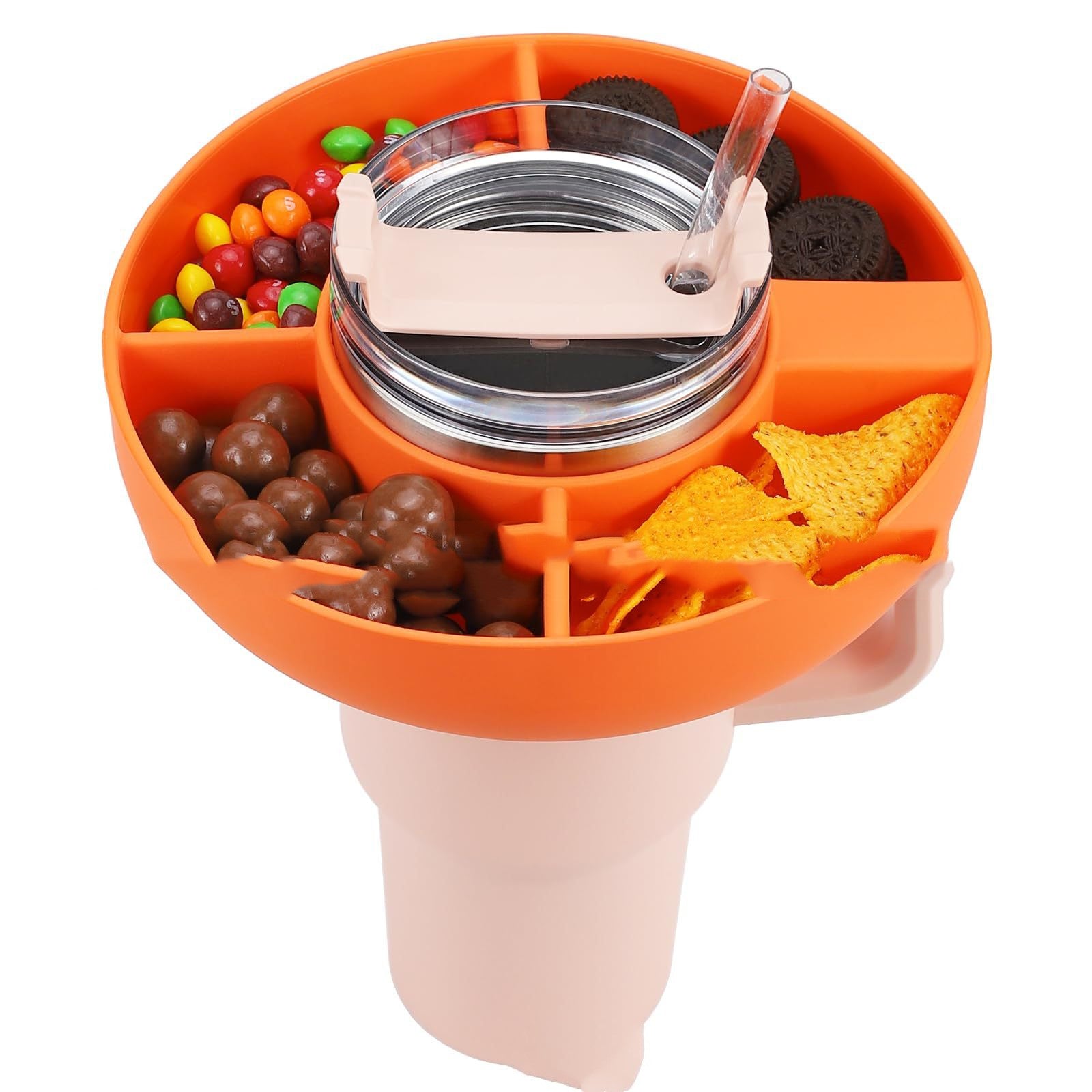 Orange 4-compartment silicone snack tray fitted onto a pale pink tumbler filled with assorted snacks and a straw.
