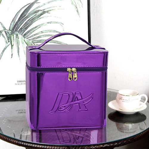 Shiny purple, large-capacity portable makeup bag with a top handle, double-zipper closure, and embossed DA logo.