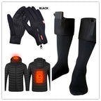 Black winter gloves with zippered cuffs, heated black socks, and a black puffer jacket with heating elements.