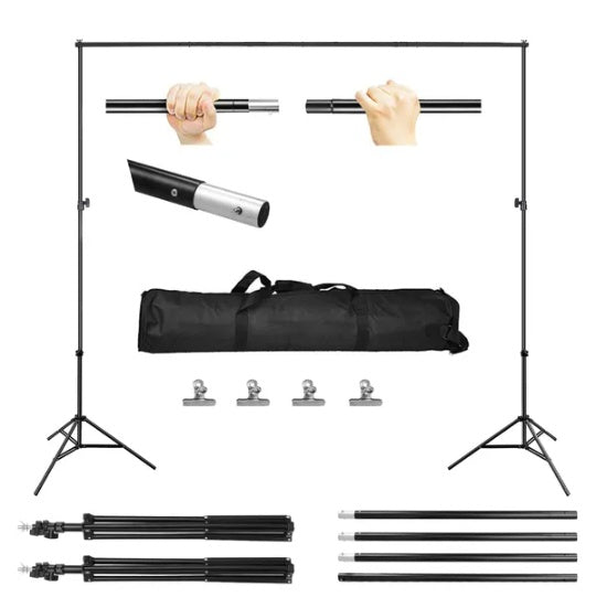 Black adjustable backdrop stand set with two tripods, crossbars, carrying bag, and four clips on a white background.