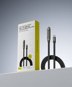 Black braided 30W fast-charging cable with a built-in foldable phone stand, displayed in yellow and white packaging.