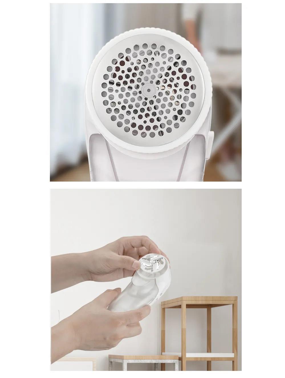 White handheld lint remover with a circular mesh head and internal blades, being assembled by hands.