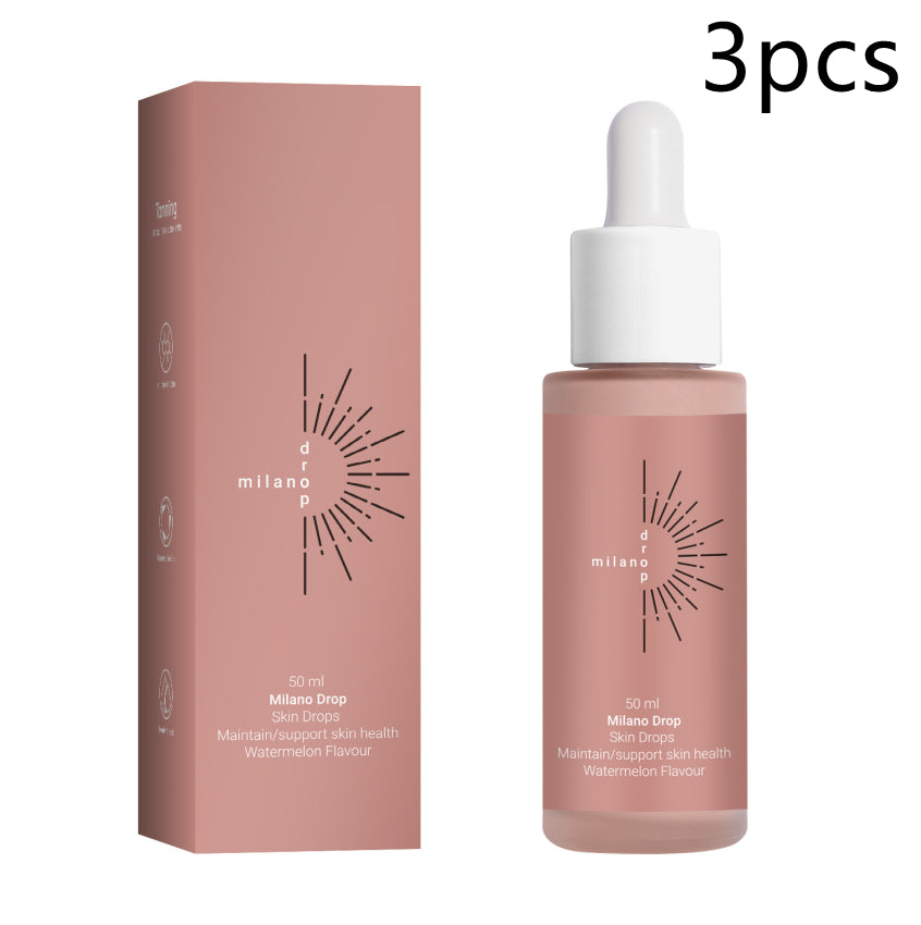 Three 50ml bottles and boxes of Milano Drop tanning skin serum in matte dusty pink with white dropper caps.
