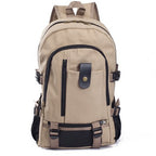 Tan canvas men’s backpack with black trim, multiple zippered pockets, leather-style tab, and side mesh bottle holders.