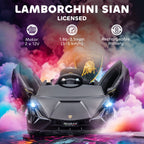 Black Lamborghini Sian electric kids' car with open scissor doors and LED headlights against a colorful smoke backdrop.