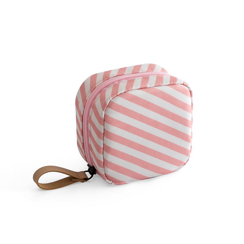Small, square makeup bag with pink and white diagonal stripes, a zipper closure, and a tan leather-look wrist strap.