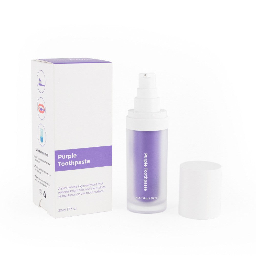 V34 purple teeth whitening toothpaste in a pump bottle next to its white and purple box with usage instructions.