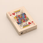 Metallic silver rectangular windproof lighter featuring a King of Hearts playing card design on a textured surface.