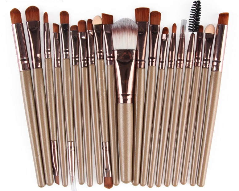 Digitaldistribution375 makeup brush set featuring tan wooden handles, copper ferrules, and soft brown and white bristles.