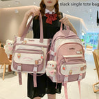 Person holding a pink and white Korean-style backpack and tote set with cute character pins and a fuzzy bear keychain.