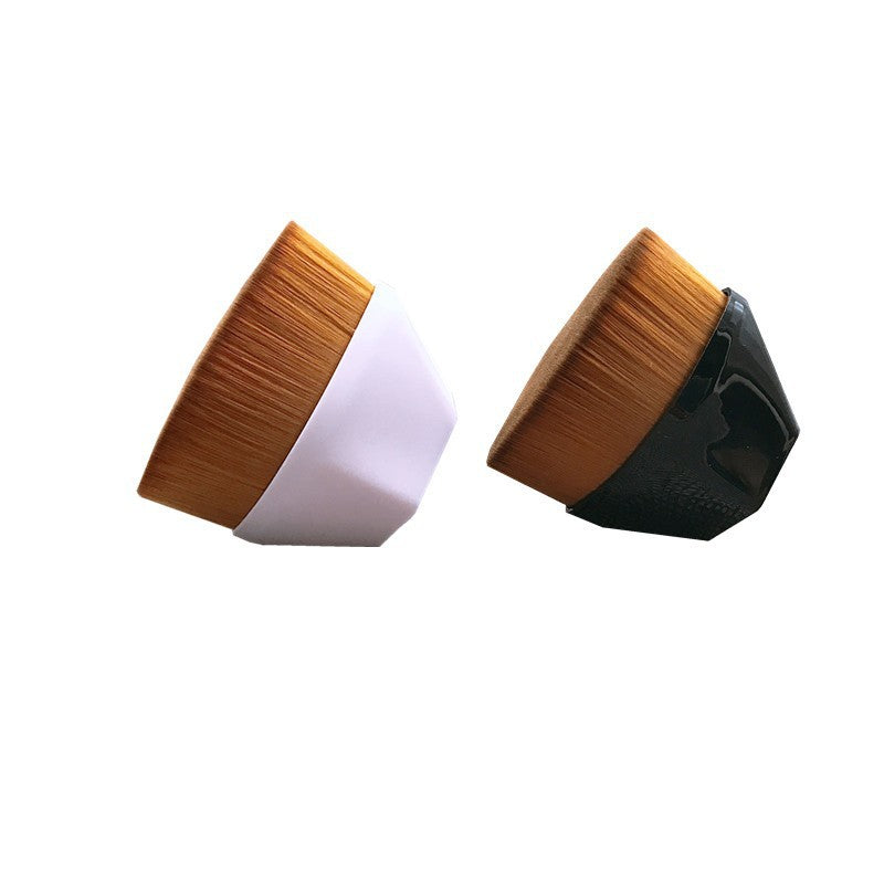 Two flat-top makeup brushes with dense, brown bristles and glossy white and black handles on a white background.