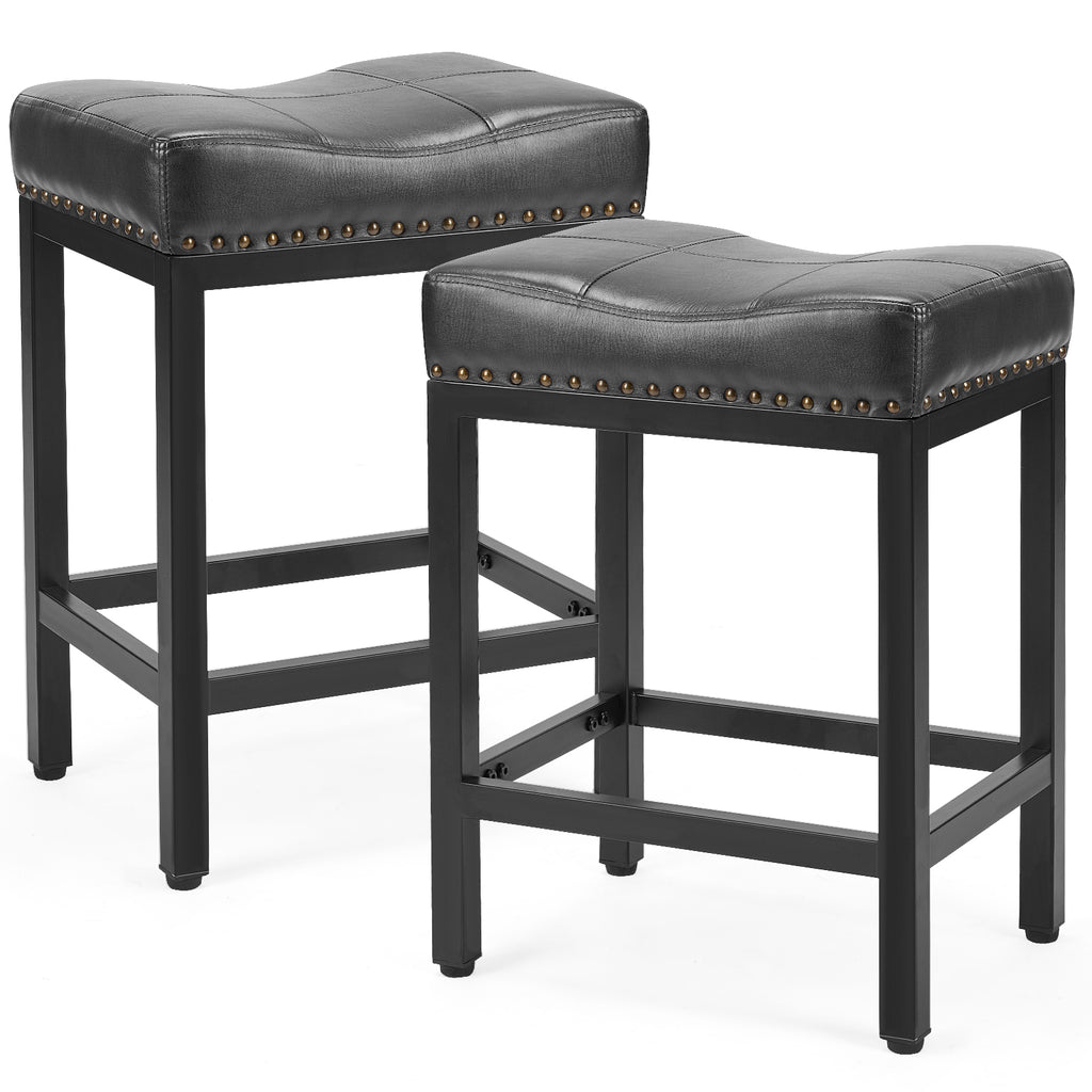Two black saddle bar stools with black steel frames, cushioned leather-look seats, and antique nailhead trim.