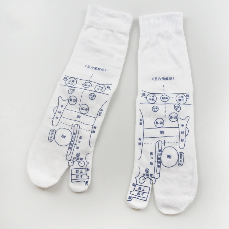Pair of white cotton reflexology socks featuring printed blue acupressure point diagrams and toe-separator design.