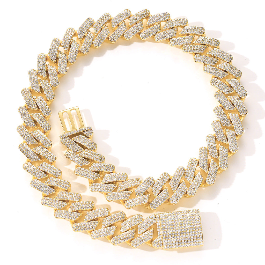 Gold-tone hip hop cuban link chain encrusted with sparkling white zircon stones, featuring a box clasp closure.