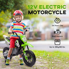 A child in a helmet rides a green 12V electric dirt bike with training wheels, outdoors.
