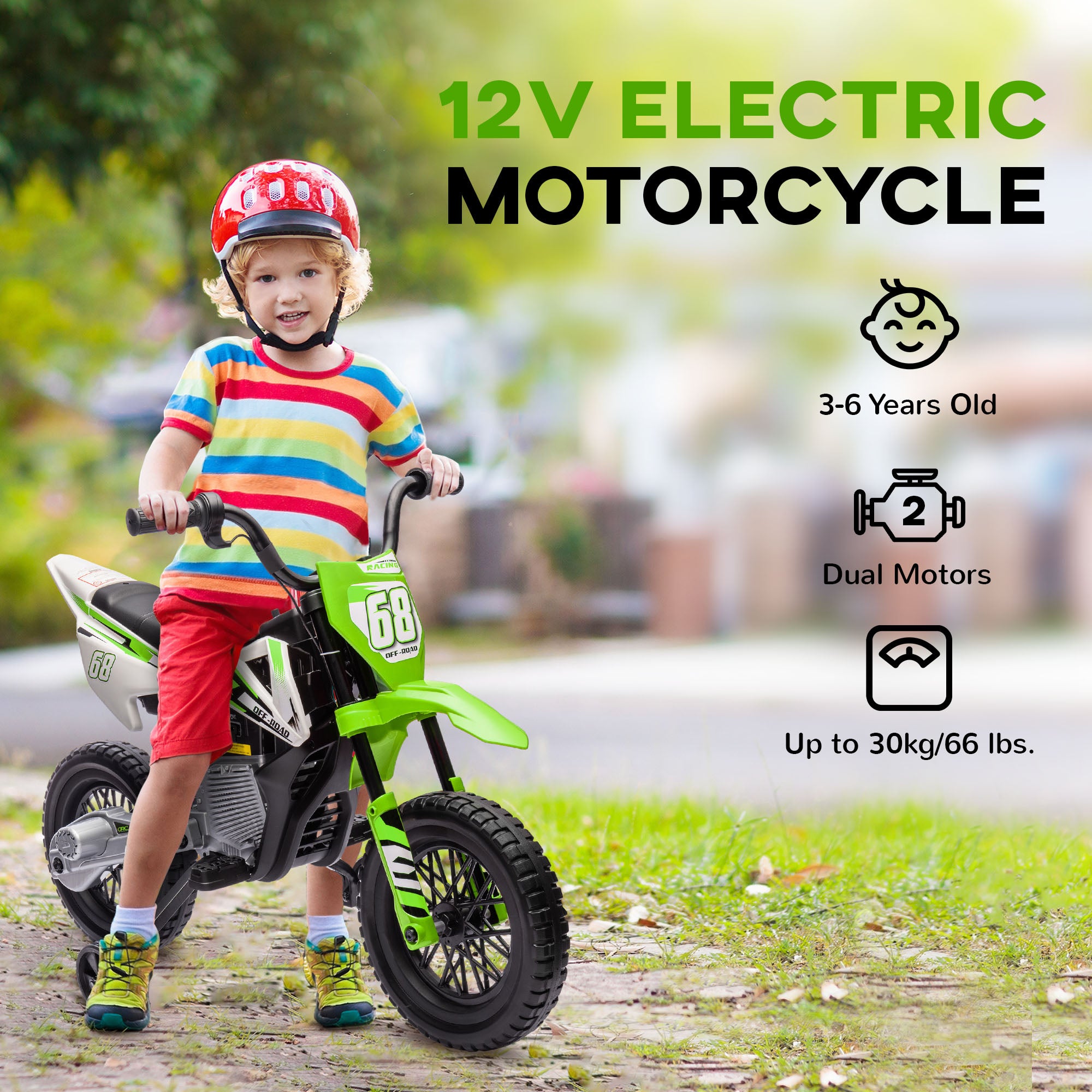 A child in a helmet rides a green 12V electric dirt bike with training wheels, outdoors.